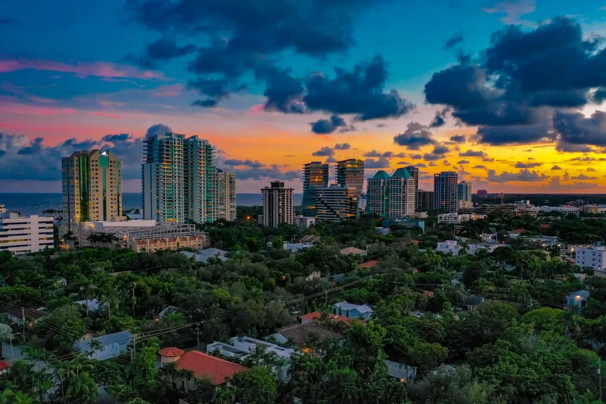 Aerial view of high-rises and homes along the Coconut Grove waterfront and marina