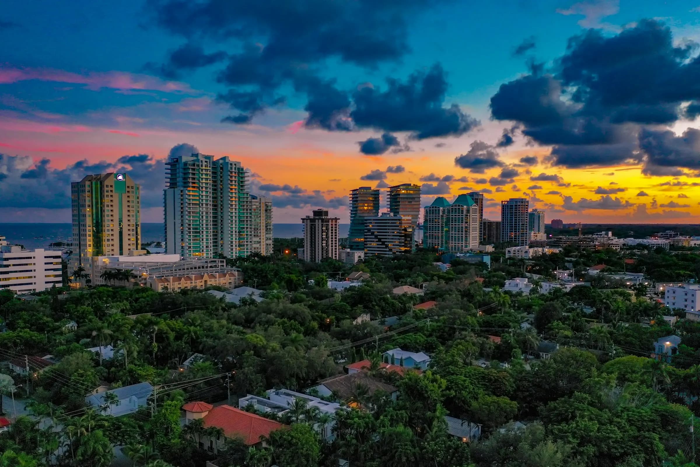 Aerial view of high-rises and homes along the Coconut Grove waterfront and marina