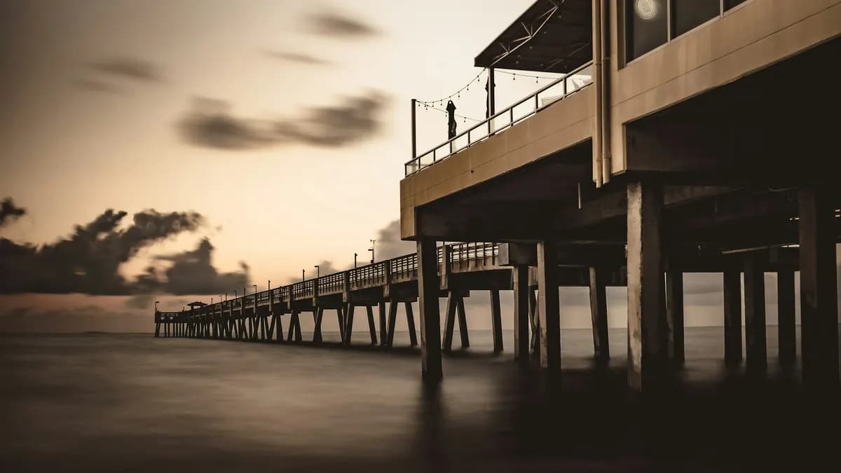 Silhouette of the Dania Beach Pier over the ocean
