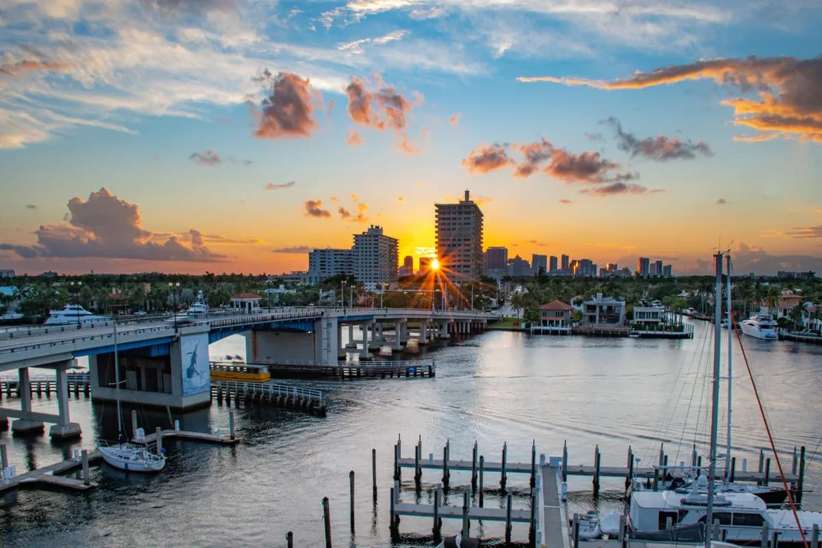 Sunrise over the Las Olas bridge, marina and Fort Lauderdale skyline