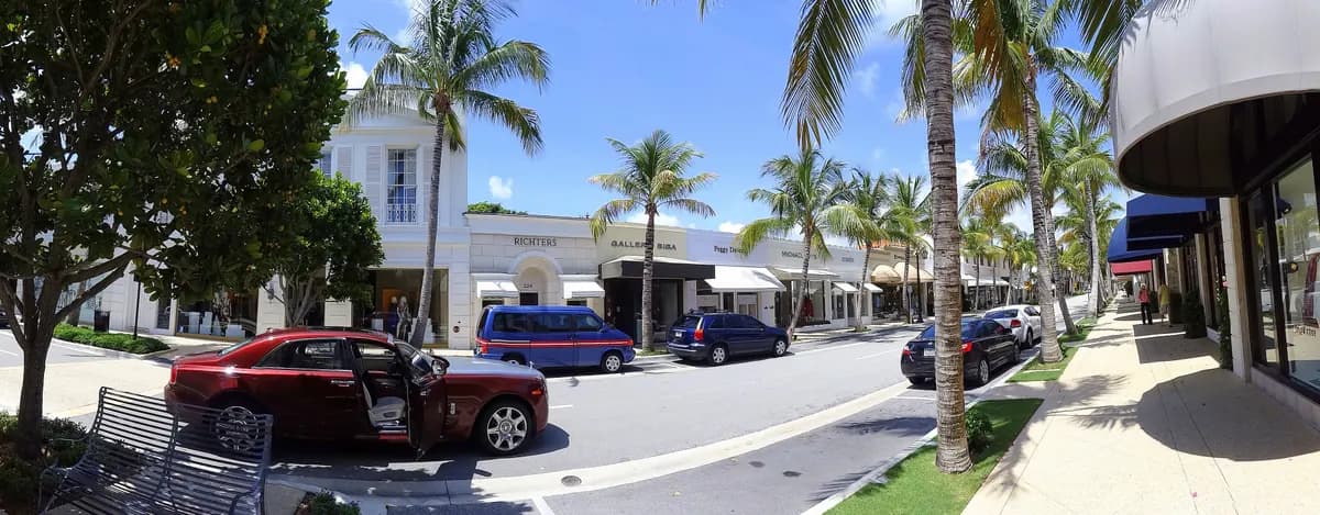 Worth Avenue boutiques and palm trees in Palm Beach, Florida