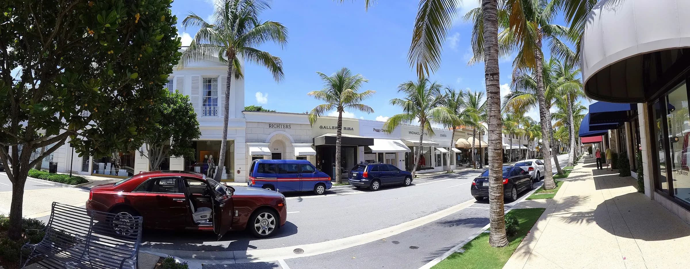 Worth Avenue boutiques and palm trees in Palm Beach, Florida
