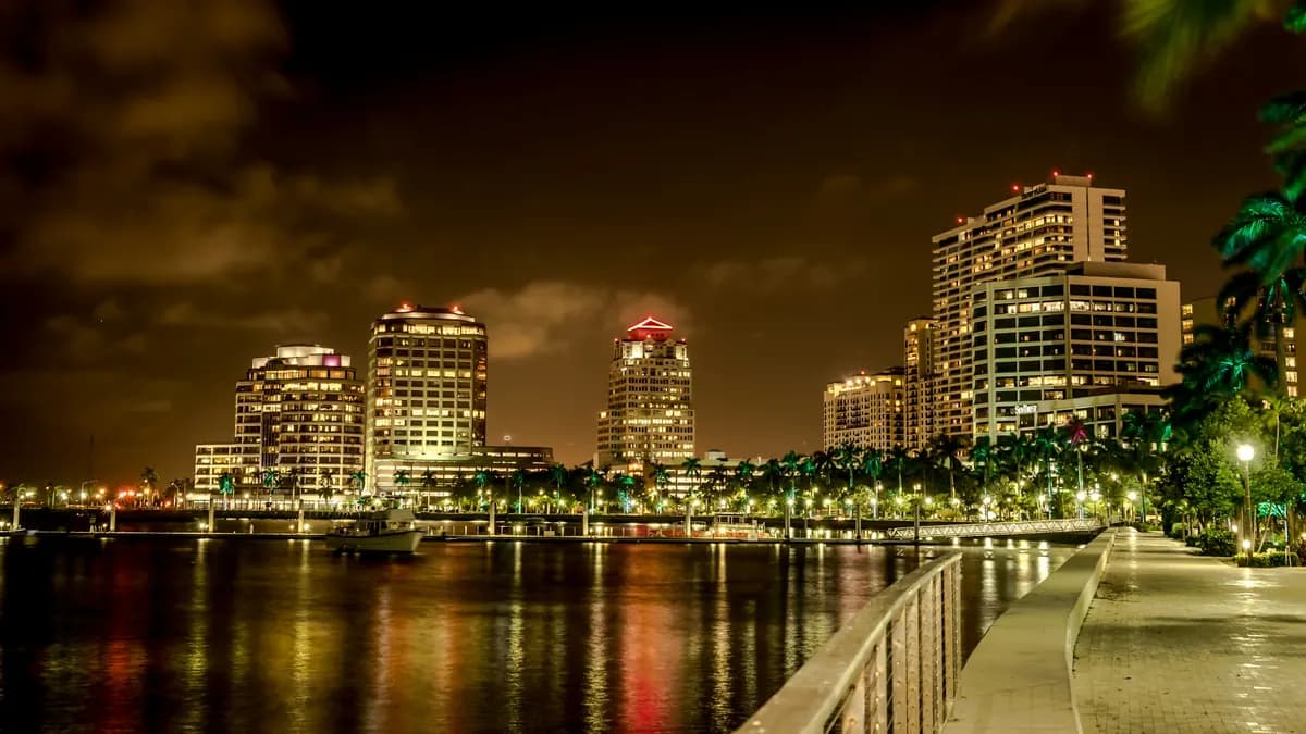 West Palm Beach skyline lit at night along the water